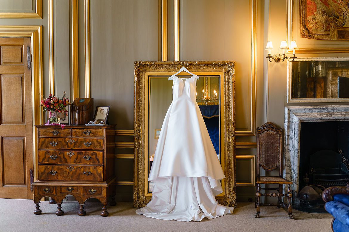 wedding dress hanging in Glemham Hall