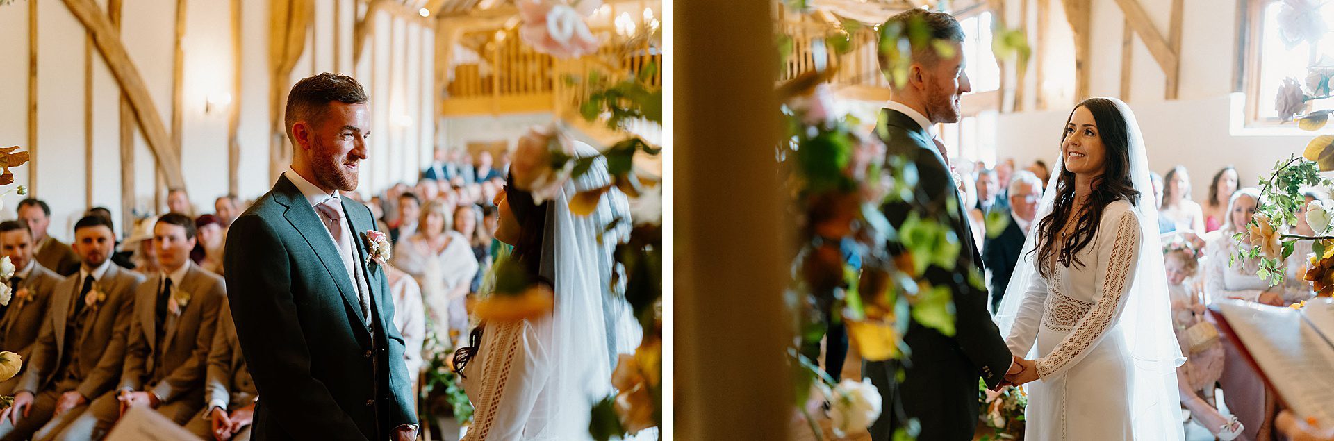 bride and groom during the wedding ceremony in the barn at Bruisyard