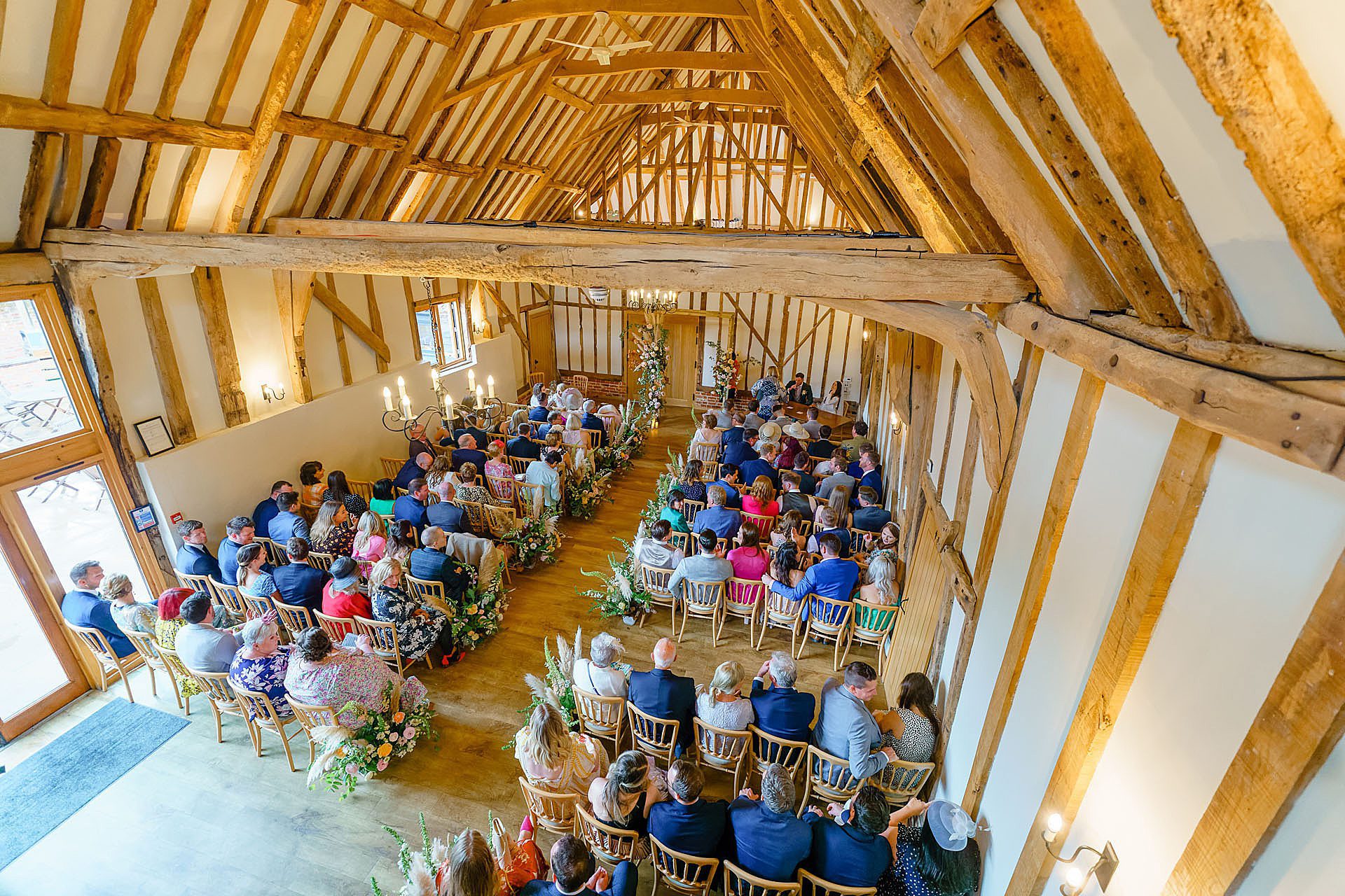 full wedding barn during the wedding ceremony