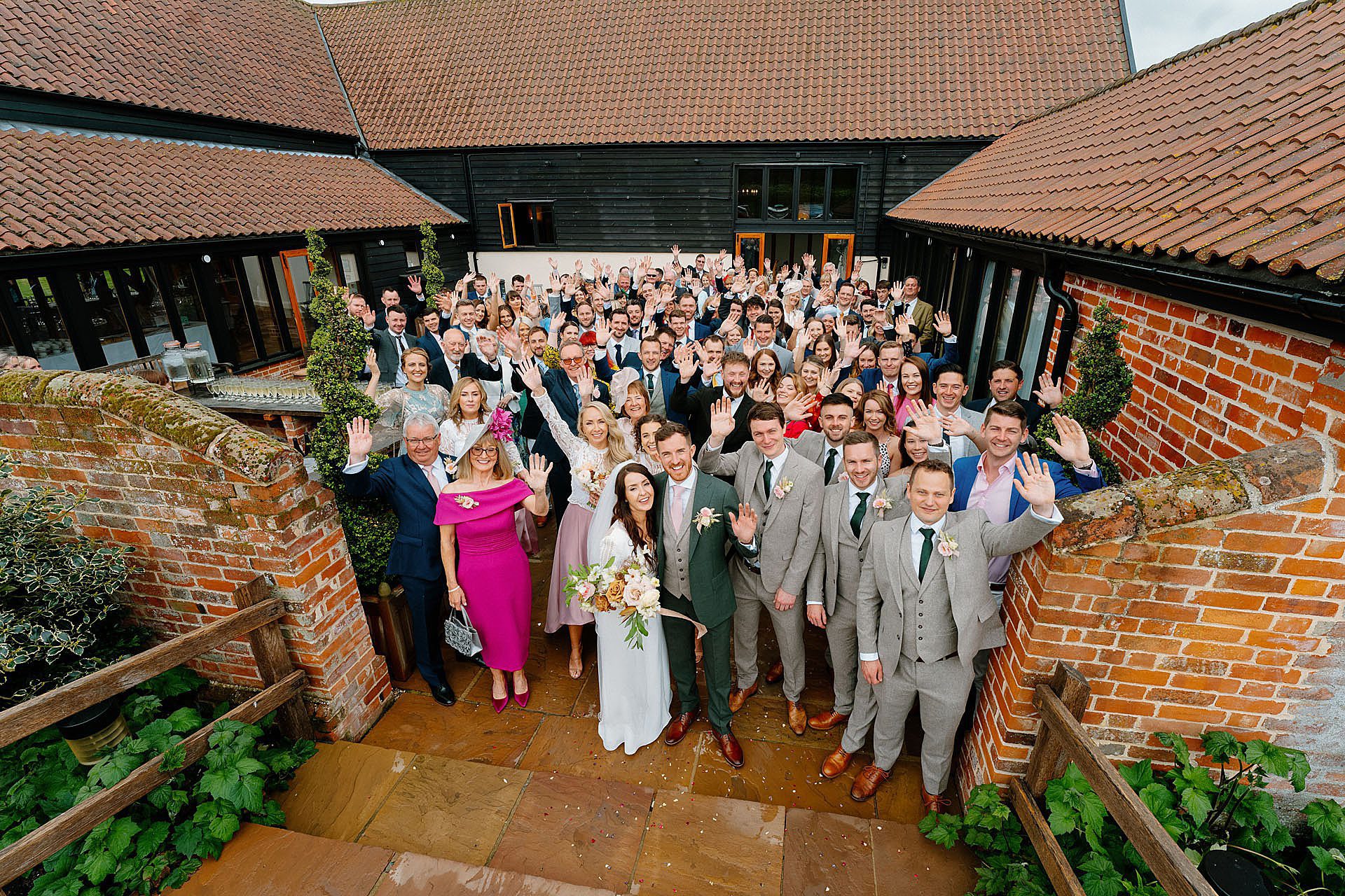group photo in the courtyard at the barn of Bruisyard Hall