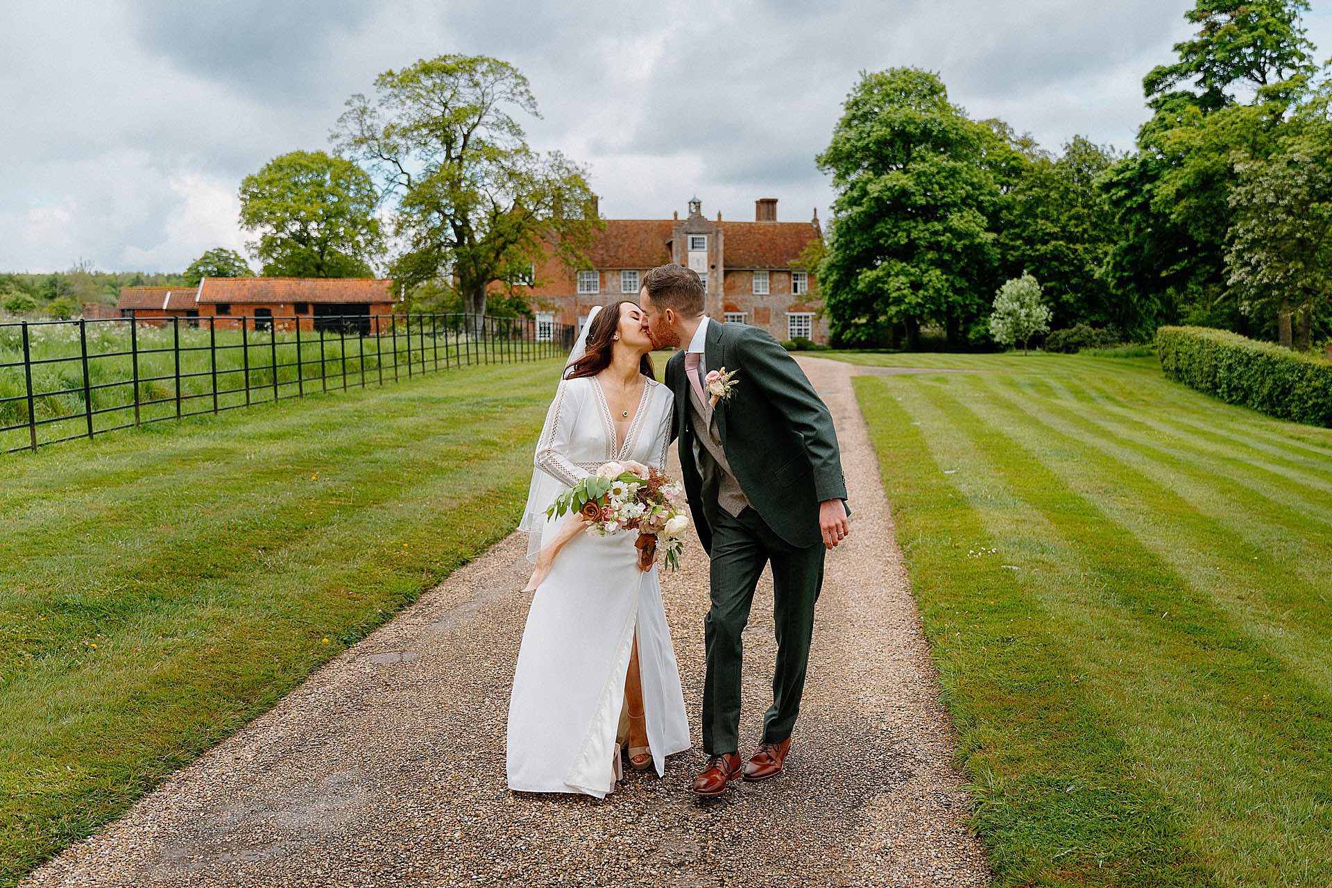Chic editorial bride and groom at Bruisyard Hall
