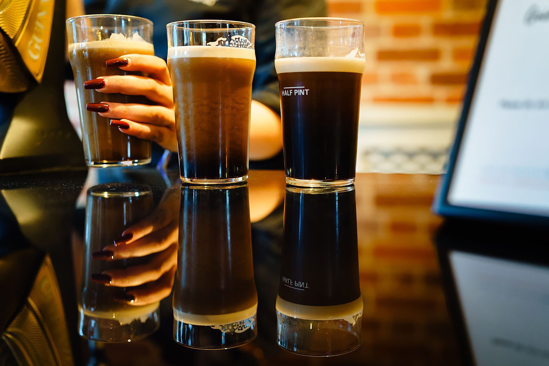 Pouring pints of Guinness at a wedding