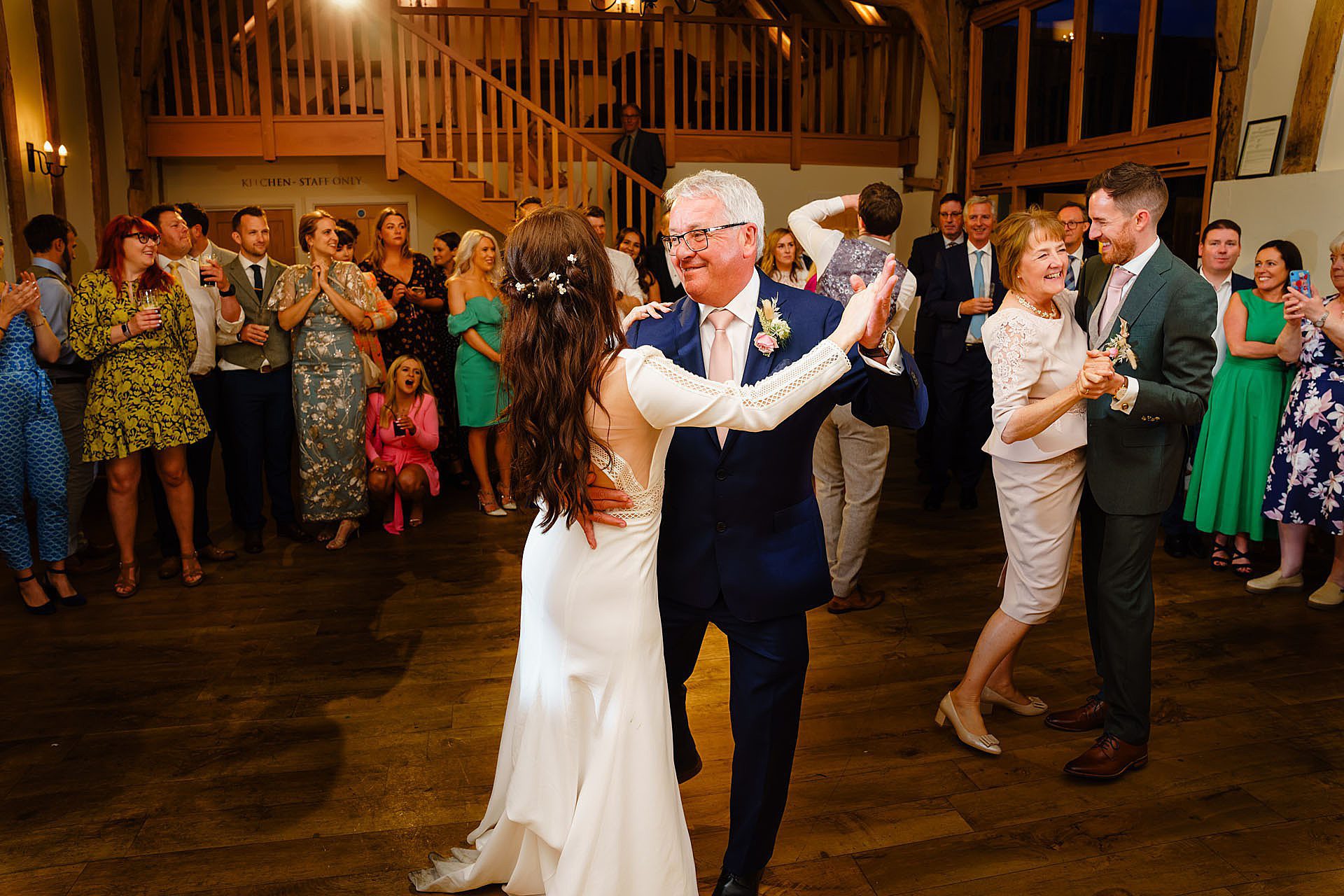 bride dancing with her father in barn at Bruisyard