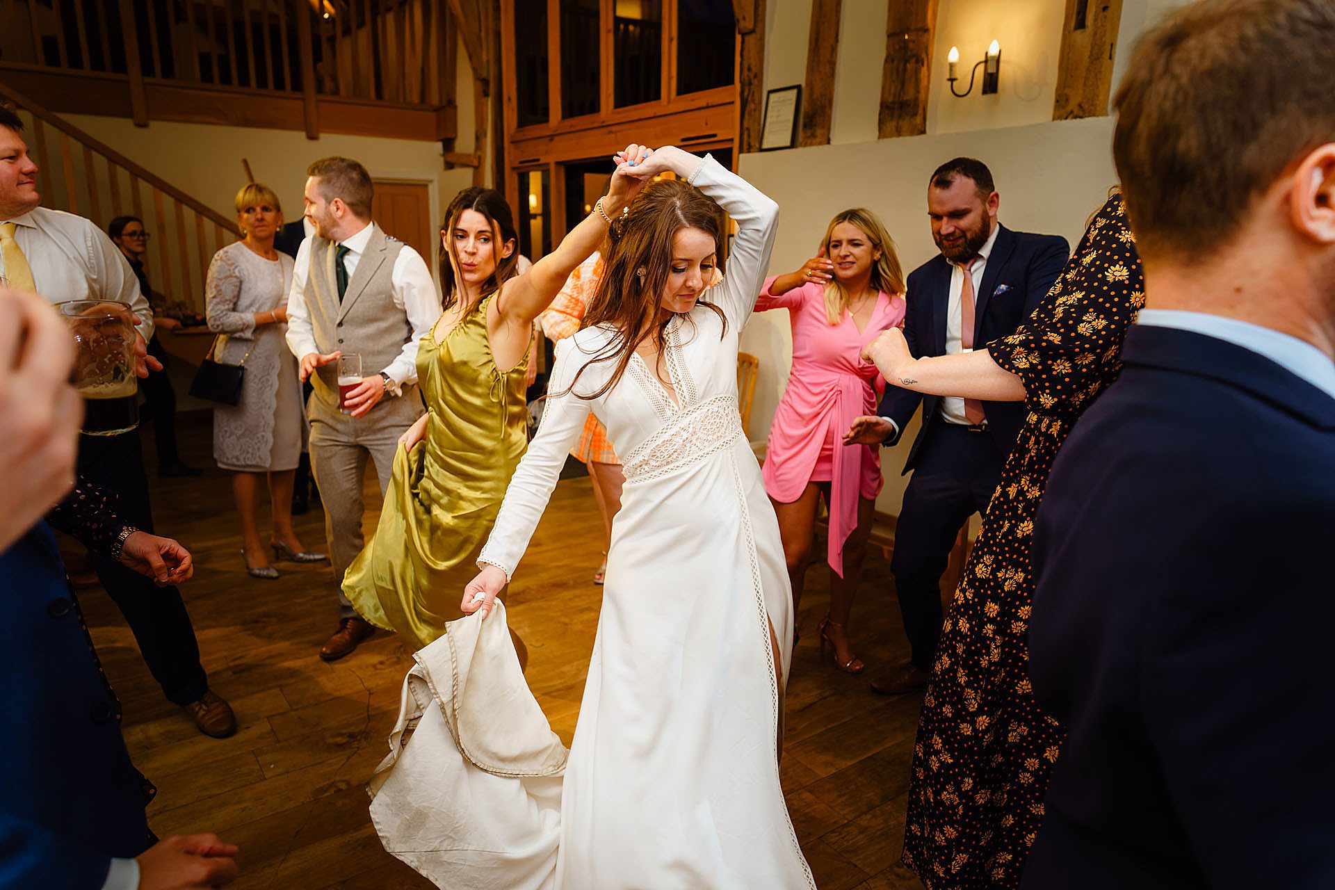 bride dancing at Bruisyard Hall wedding