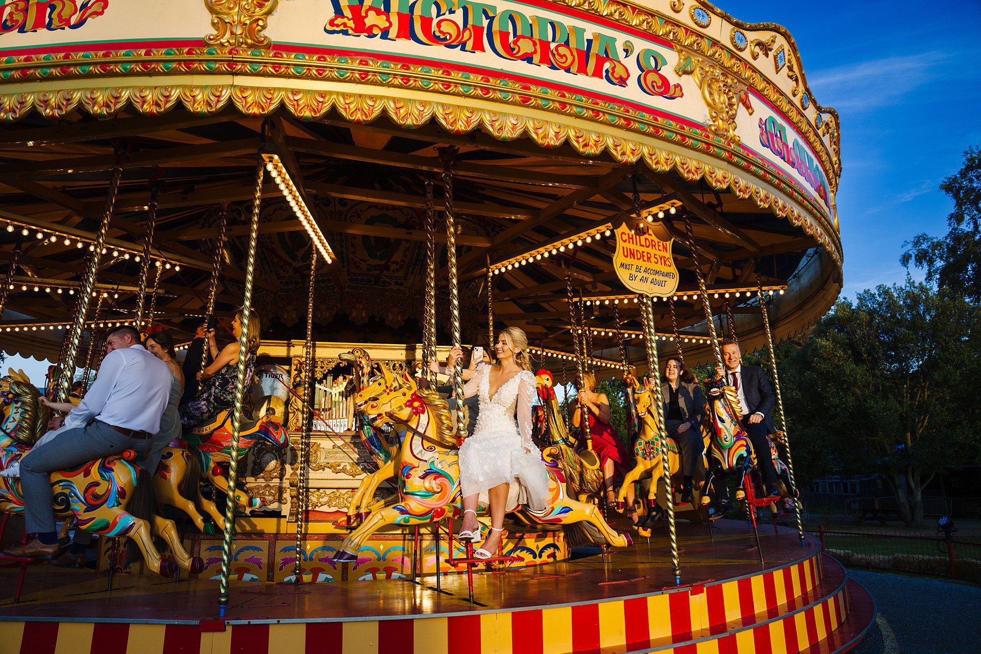 bride on the gallopers at bressingham hall