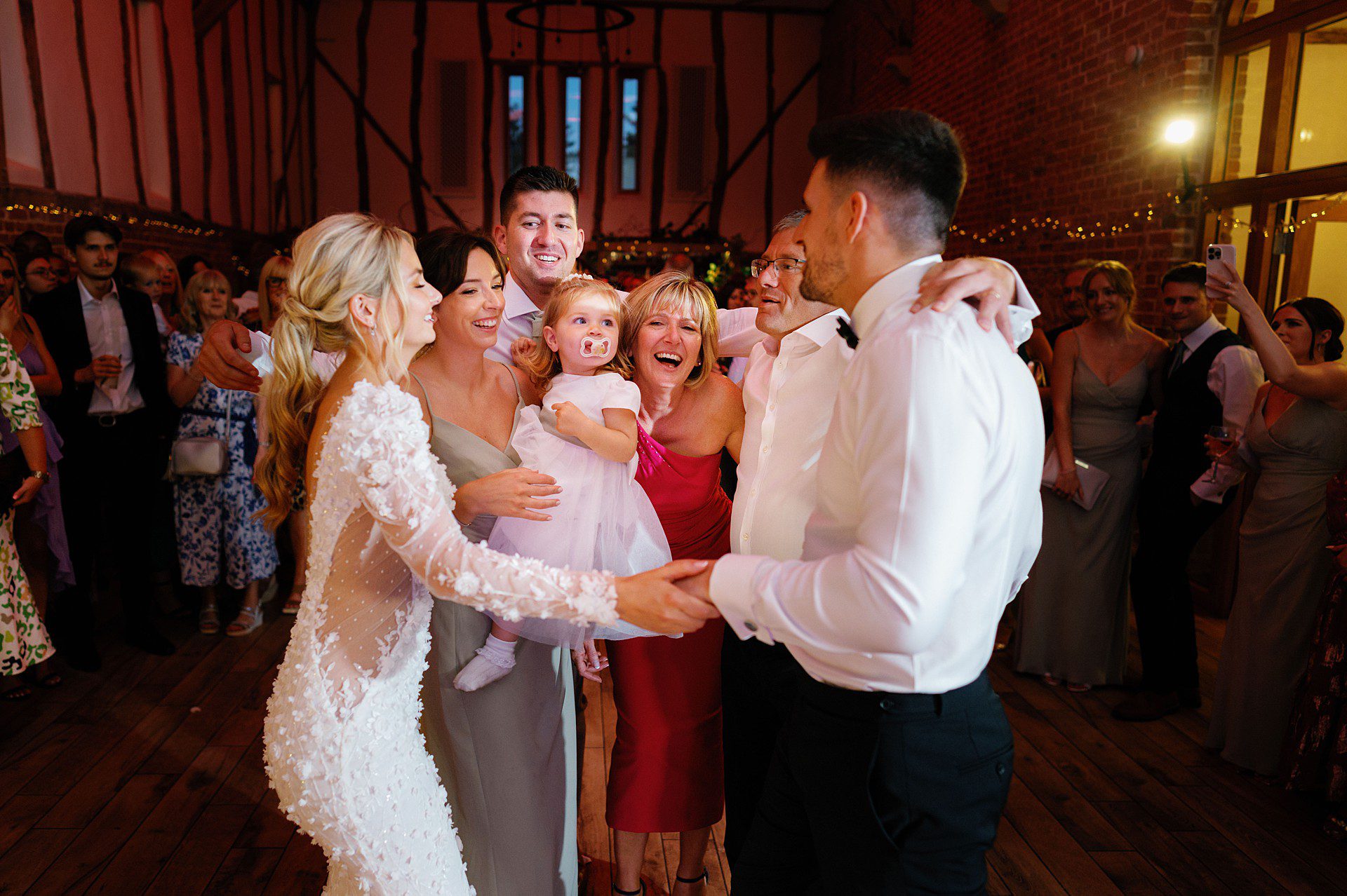 brides family on the dance floor at Bressingham Hall wedding